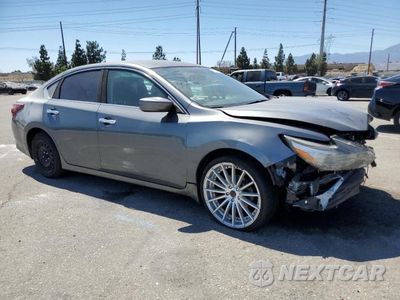 Czwarte zdjęcie samochodu z boku: 2018 NISSAN ALTIMA 2.5 VIN:1N4AL3AP5JC138728 - miniatura