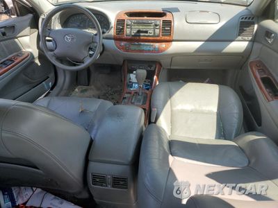 Zdjęcie 8 z 12 samochodu: 2003 TOYOTA CAMRY LE VIN:4T1BE30K53U734560 - miniatura