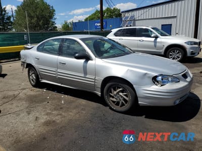 Czwarte zdjęcie samochodu z boku: 2002 PONTIAC GRAND AM SE1 VIN:1G2NF52F12C254423 - miniatura