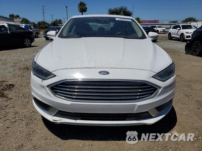 Piąte zdjęcie samochodu w środku: 2018 FORD FUSION SE HYBRID VIN:3FA6P0LUXJR118763 - miniatura