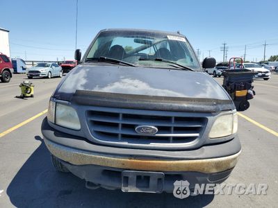 Piąte zdjęcie samochodu w środku: 2000 FORD F150 VIN:2FTRX18W1YCB03806 - miniatura