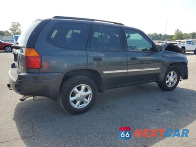 Trzecie zdjęcie samochodu z tyłu: 2007 GMC ENVOY VIN:1GKDS13S872183973 - miniatura