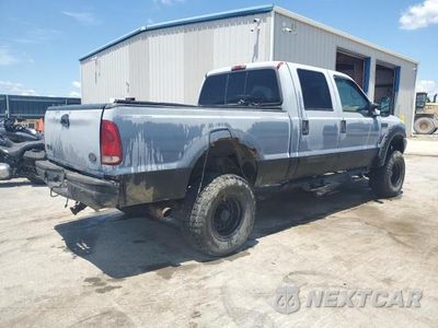 Trzecie zdjęcie samochodu z tyłu: 2002 FORD F250 SUPER DUTY VIN:1FTNW21F12EC94310 - miniatura