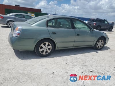 Trzecie zdjęcie samochodu z tyłu: 2003 NISSAN ALTIMA BASE VIN:1N4AL11D83C186012 - miniatura