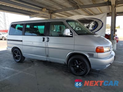 Czwarte zdjęcie samochodu z boku: 2003 VOLKSWAGEN EUROVAN MV VIN:WV2MB470X3H021096 - miniatura