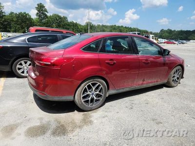 Trzecie zdjęcie samochodu z tyłu: 2017 FORD FOCUS SEL VIN:1FADP3H25HL337011 - miniatura