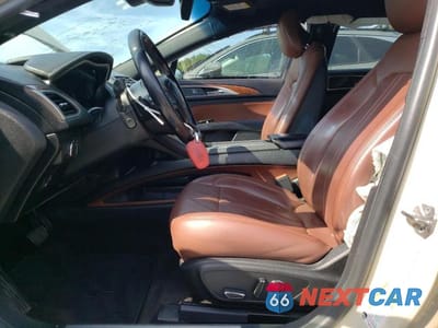 Zdjęcie 7 z 12 samochodu: 2018 LINCOLN MKZ RESERVE VIN:3LN6L5F92JR619619 - miniatura
