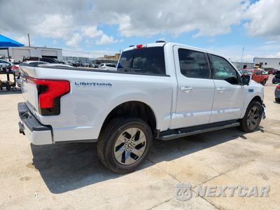 Trzecie zdjęcie samochodu z tyłu: 2025 FORD F150 LIGHTNING LARIAT VIN:1FT6W5L73SWG07346 - miniatura