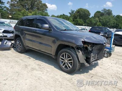 Czwarte zdjęcie samochodu z boku: 2018 JEEP GRAND CHEROKEE LAREDO VIN:1C4RJFAG6JC401975 - miniatura