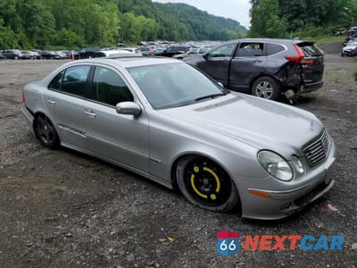 Czwarte zdjęcie samochodu z boku: 2003 MERCEDES-BENZ E 500 VIN:WDBUF70J23A148794 - miniatura