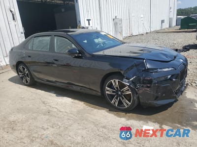 Czwarte zdjęcie samochodu z boku: 2024 BMW 750 XE VIN:WBA43EH04RCT01566 - miniatura