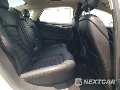 Zdjęcie 10 z 12 samochodu: 2017 FORD FUSION SE HYBRID VIN:3FA6P0LU1HR359623 - miniatura