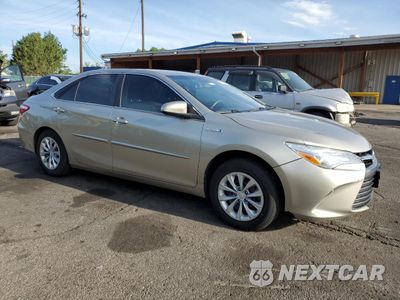 Czwarte zdjęcie samochodu z boku: 2015 TOYOTA CAMRY HYBRID VIN:4T1BD1FK8FU175394 - miniatura