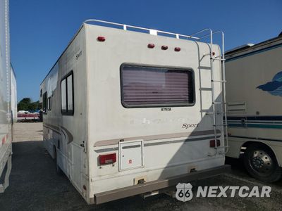 Trzecie zdjęcie samochodu z tyłu: 2002 FORD ECONOLINE E450 SUPER DUTY CUTAWAY VAN VIN:1FDXE45S22HB06225 - miniatura