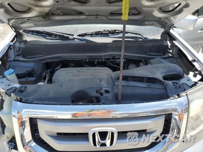Zdjęcie 11 z 14 samochodu: 2011 HONDA PILOT TOURING VIN:5FNYF4H95BB056709 - miniatura