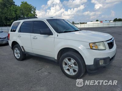 Czwarte zdjęcie samochodu z boku: 2010 MAZDA TRIBUTE I VIN:4F2CY0C74AKM02754 - miniatura