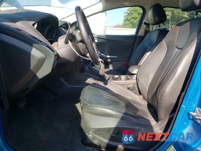 Zdjęcie 7 z 14 samochodu: 2012 FORD FOCUS TITANIUM VIN:1FAHP3N25CL230197 - miniatura