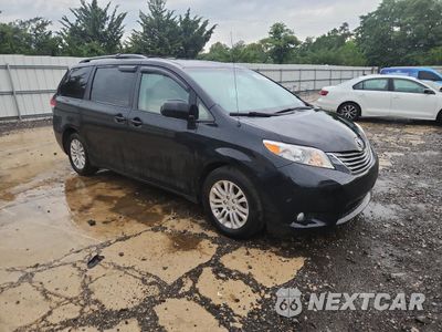 Czwarte zdjęcie samochodu z boku: 2014 TOYOTA SIENNA XLE VIN:5TDYK3DC1ES526340 - miniatura