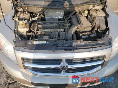 Zdjęcie 11 z 13 samochodu: 2009 DODGE CALIBER SXT VIN:1B3HB48A69D116196 - miniatura