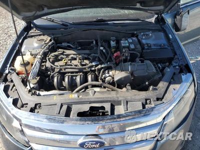 Zdjęcie 21 z 24 samochodu: 2012 FORD FUSION SE VIN:3FAHP0HA7CR203389 - miniatura