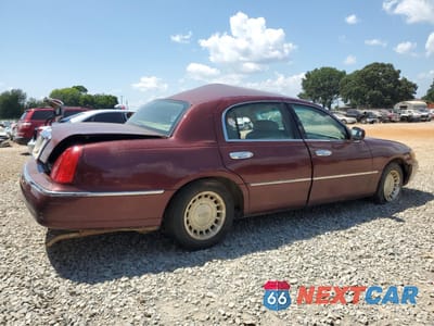 Trzecie zdjęcie samochodu z tyłu: 2000 LINCOLN TOWN CAR EXECUTIVE VIN:1LNHM81W6YY774724 - miniatura