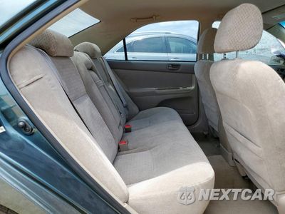 Zdjęcie 10 z 13 samochodu: 2002 TOYOTA CAMRY LE VIN:4T1BE30K92U633441 - miniatura