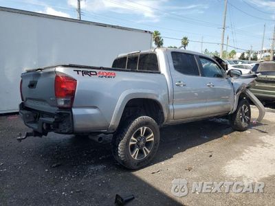 Trzecie zdjęcie samochodu z tyłu: 2016 TOYOTA TACOMA TRD SPORT VIN:3TMCZ5ANXGM019429 - miniatura