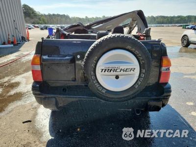 Zdjęcie 6 z 12 samochodu: 1999 CHEVROLET TRACKER VIN:2CNBE18C9X6925601 - miniatura
