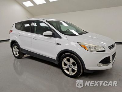 Czwarte zdjęcie samochodu z boku: 2014 FORD ESCAPE SE VIN:1FMCU0GX4EUC91876 - miniatura