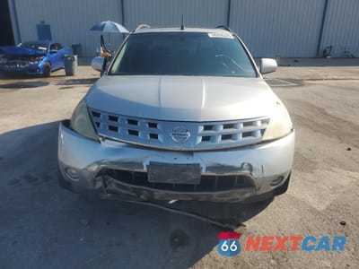 Piąte zdjęcie samochodu w środku: 2003 NISSAN MURANO SL VIN:JN8AZ08W53W201174 - miniatura
