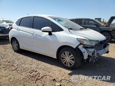 Czwarte zdjęcie samochodu z boku: 2016 HONDA FIT LX VIN:JHMGK5H53GX045455 - miniatura