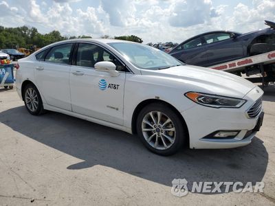 Czwarte zdjęcie samochodu z boku: 2017 FORD FUSION SE HYBRID VIN:3FA6P0LU8HR409465 - miniatura