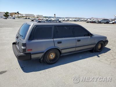 Trzecie zdjęcie samochodu z tyłu: 1991 TOYOTA COROLLA DLX VIN:JT2AE94K1M3460304 - miniatura