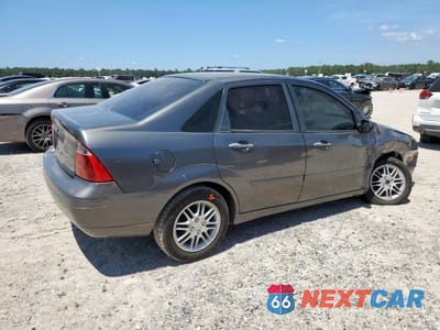 Trzecie zdjęcie samochodu z tyłu: 2007 FORD FOCUS ZX4 VIN:1FAFP34N87W322203 - miniatura