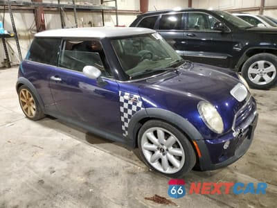 Czwarte zdjęcie samochodu z boku: 2006 MINI COOPER S VIN:WMWRE33586TJ36088 - miniatura