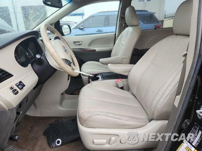 Zdjęcie 7 z 13 samochodu: 2014 TOYOTA SIENNA XLE VIN:5TDYK3DC1ES526340 - miniatura