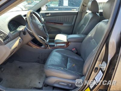 Zdjęcie 7 z 12 samochodu: 2002 TOYOTA CAMRY LE VIN:4T1BF30K72U513151 - miniatura