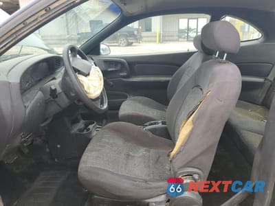 Zdjęcie 7 z 14 samochodu: 2002 FORD ESCORT ZX2 VIN:3FAFP11372R156517 - miniatura