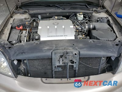 Zdjęcie 11 z 12 samochodu: 2004 CADILLAC DEVILLE VIN:1G6KD54Y84U103355 - miniatura