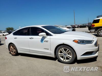 Czwarte zdjęcie samochodu z boku: 2018 FORD FUSION SE HYBRID VIN:3FA6P0LU3JR129846 - miniatura