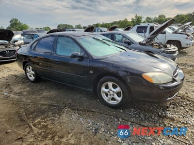 Czwarte zdjęcie samochodu z boku: 2003 FORD TAURUS SES VIN:1FAHP55S73G187468 - miniatura