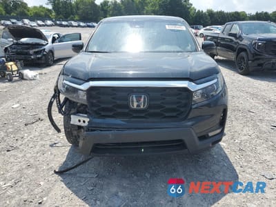 Piąte zdjęcie samochodu w środku: 2023 HONDA PASSPORT EXL VIN:5FNYF8H56PB020149 - miniatura