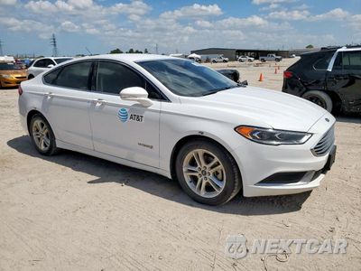 Czwarte zdjęcie samochodu z boku: 2018 FORD FUSION SE HYBRID VIN:3FA6P0LU0JR171634 - miniatura