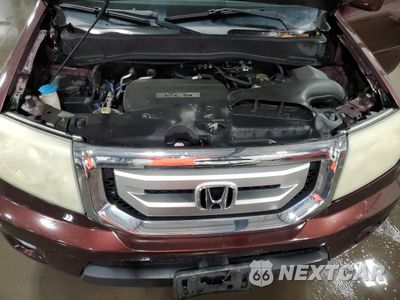Zdjęcie 12 z 13 samochodu: 2010 HONDA PILOT EX VIN:5FNYF3H44AB009278 - miniatura