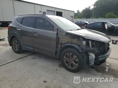 Czwarte zdjęcie samochodu z boku: 2014 HYUNDAI SANTA FE SPORT VIN:5XYZU3LB9EG150555 - miniatura