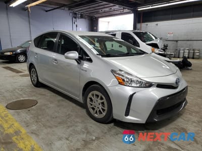 Czwarte zdjęcie samochodu z boku: 2015 TOYOTA PRIUS V VIN:JTDZN3EU1FJ038779 - miniatura