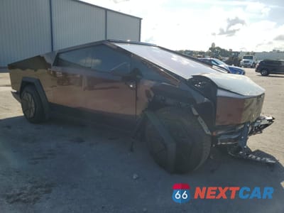Czwarte zdjęcie samochodu z boku: 2024 TESLA CYBERTRUCK VIN:7G2CEHEE7RA030493 - miniatura