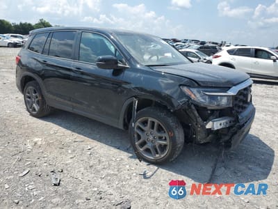 Czwarte zdjęcie samochodu z boku: 2023 HONDA PASSPORT EXL VIN:5FNYF8H56PB020149 - miniatura