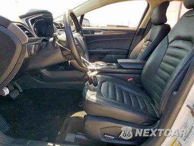 Zdjęcie 7 z 12 samochodu: 2018 FORD FUSION SE HYBRID VIN:3FA6P0LU3JR129846 - miniatura