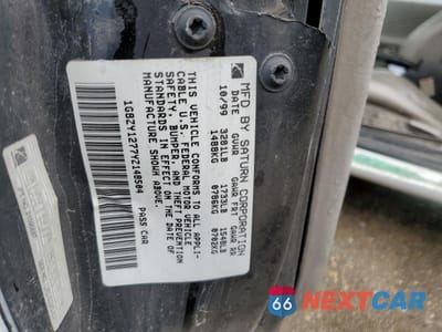Zdjęcie 12 z 14 samochodu: 2000 SATURN SC2 VIN:1G8ZY1277YZ148504 - miniatura